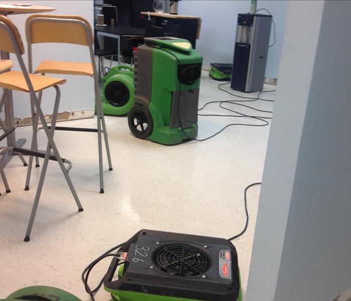 Air movers in school building.